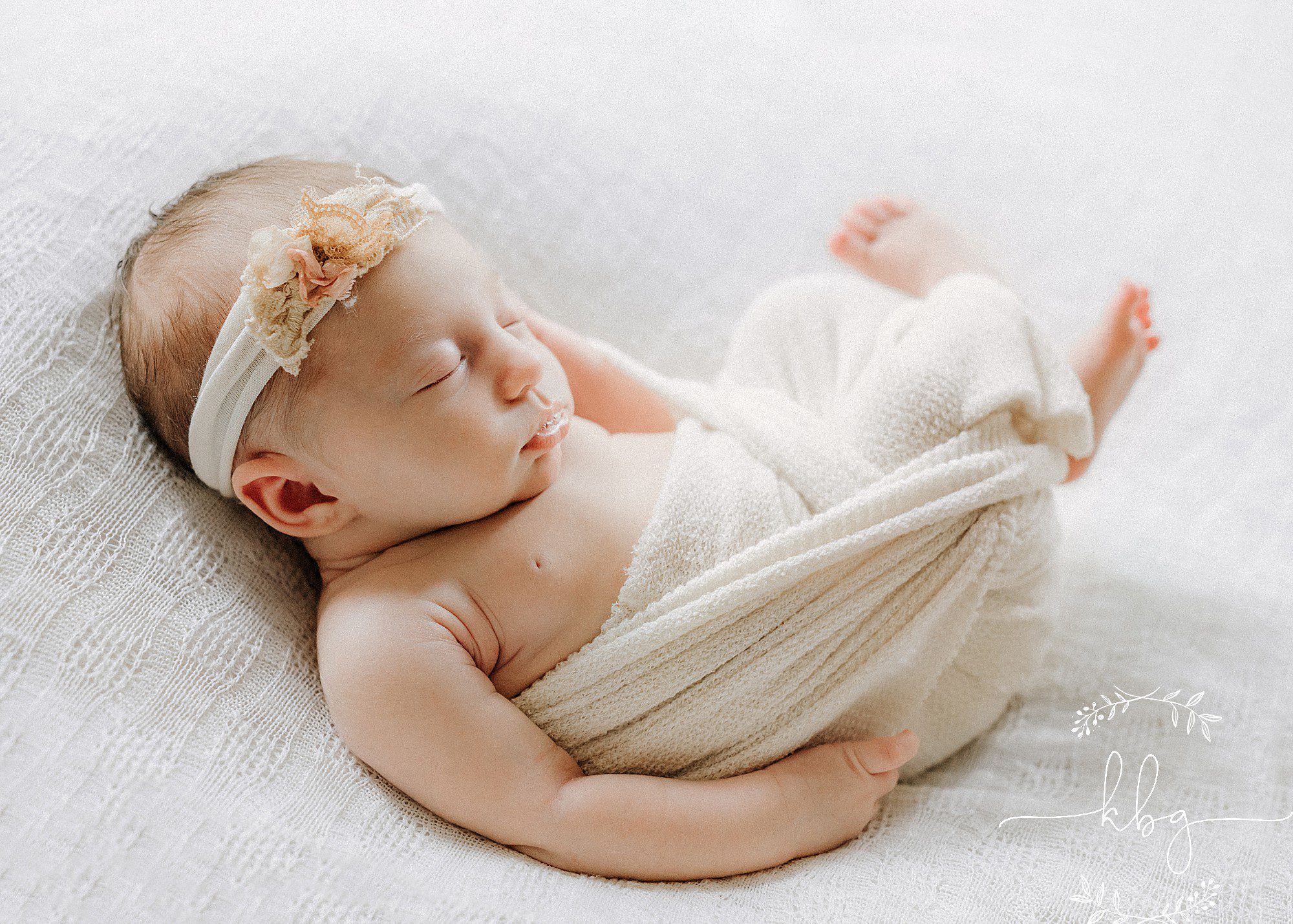newborn baby girl on beanbag - sandy springs newborn photographer