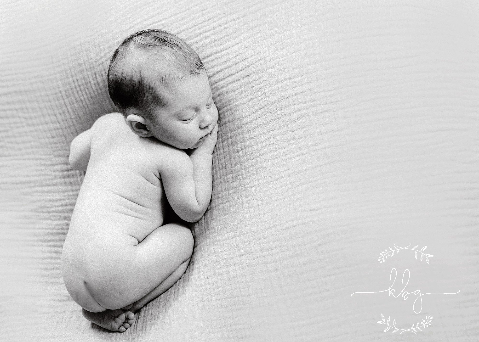 newborn girl on beanbag - simply baby - simple pure newborn photography 
