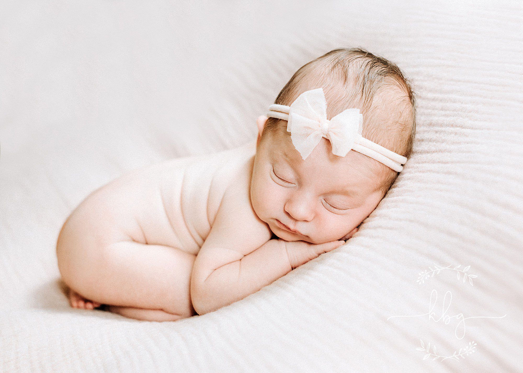 atlanta newborn photographer - baby girl on beanbag