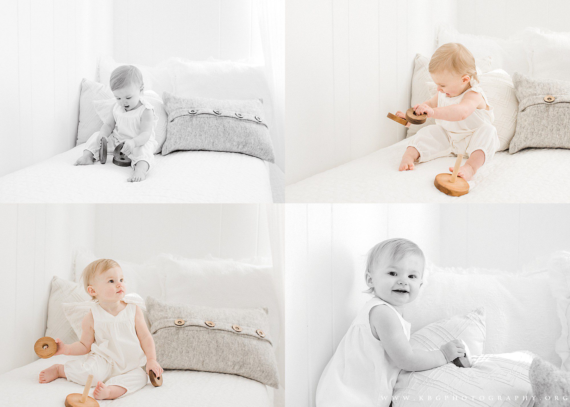 marietta baby photographer - one year old baby playing with blocks on the bed