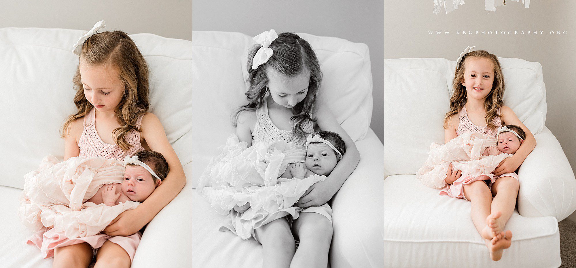 marietta baby photographer - big sister holding newborn baby sister