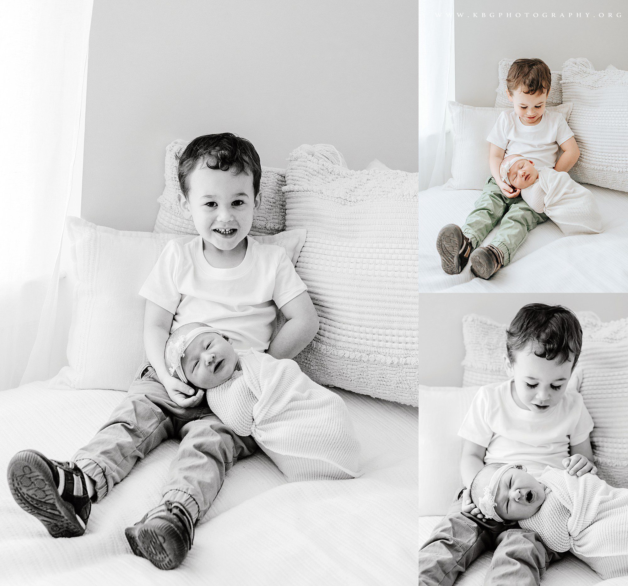 big brother posing with baby sister on bed - atlanta photographer