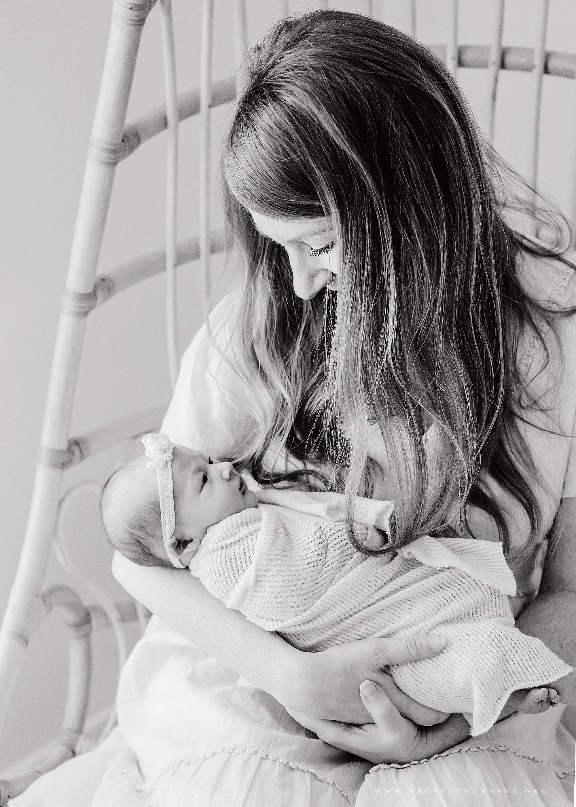mother holding new baby - atlanta newborn photographer