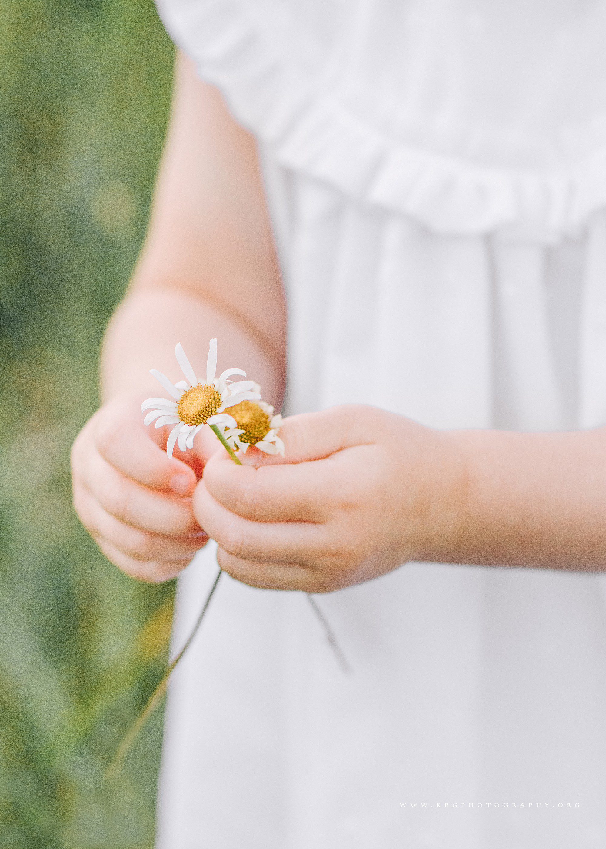 little girl holding flowers - atlanta child photographer