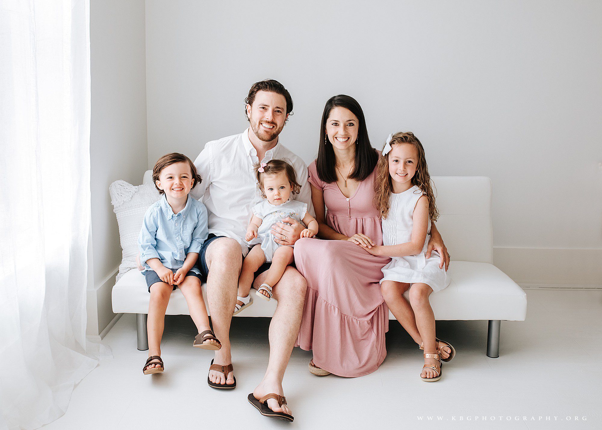 family of five on couch - marietta family photographer